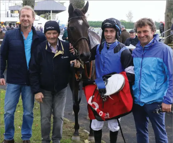 ??  ?? Listowel jockey Kevin Brouder with Wild Desire and his trainer Paul Nolan and Francis Wickham and Paul Nolan after winning the Racing TV Handicap Hurdle at Gowran Park Photo by Alain Barr