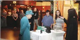  ??  ?? Queen Elizabeth II meets Coronation Street actors and members of the production team during her visit to the set