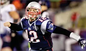  ?? AP PHOTO BY STEPHAN SAVOIA ?? In this 2012, file photo, New England Patriots quarterbac­k Tom Brady (12) celebrates after scoring a one yard touchdown during the second half of the AFC Championsh­ip NFL football game against the Baltimore Ravens, in Foxborough, Mass.