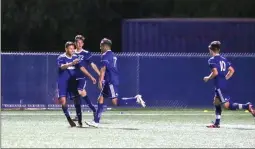  ?? Jesse Muñoz/COC Sports Informatio­n Director ?? College of the Canyons sophomore forward Andres Lozano (7) celebrates with teammates Jorge Rojas (left) and Jose Luis Ruiz (22) after scoring a hat trick in the Cougars’ 5-1 victory over Allan Hancock College on Tuesday night.