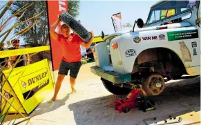  ??  ?? One of the speed trial competitio­ns tested how fast people could change a tyre