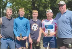  ?? ?? Congrats to Bob, Darren and Colin from Glenroe, who were the winners of the road hurling tournament. Also in photo are chairman, Frankie Carroll and treasurer, Donie Ryan.