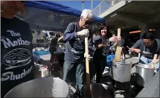  ?? JON WEIAND — SANTA CRUZ SENTINEL ?? Chowder cooks will be out in force serving their specialtie­s Saturday and Sunday at the Santa Cruz Beach Boardwalk’s wildly popular Clam Chowder Cook-Off.