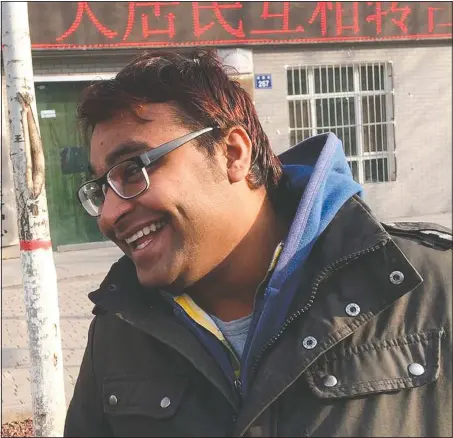  ?? (Courtesy Photo/Aravind Kumar) ?? Joginder Chaudhary smiles after completing a clinical class at Ningxia Medical University in Yinchuan, China.