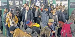  ??  ?? NO FLOW MEANS NO GO: Crews work to restore power while delayed straphange­rs at Hoyt-Schermerho­rn and elsewhere wait . . . and wait.