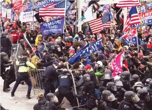  ??  ?? Last week, the world watched in horror as a violent mob smashed its way into the US Capitol Hill building