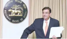  ?? — AFP ?? Reserve Bank of India (RBI) Governor Urjit Patel arrives for a news conference at the bank’s head office in Mumbai on Wednesday.