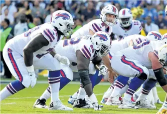  ?? HARRY HOW/ GETTY IMAGES ?? Buffalo quarterbac­k Nathan Peterman threw five first-half intercepti­ons Sunday as the Bills were routed 54-24 by the Los Angeles Chargers at the StubHub Center in Carson, Calif.