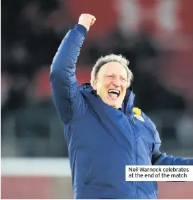  ??  ?? Neil Warnock celebrates at the end of the match