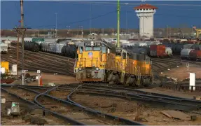  ?? Mike Danneman ?? Locomotive­s climb UP’s hump in North Platte, Neb. Autonomous cars could be self-classifyin­g and reduce dwell in yards.