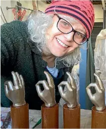  ?? PHOTO: SUPPLIED ?? Deaf artist Abbie Twiss with her 3D-printed trophies for the winners of the Deaf Short Film Competitio­n.