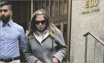  ?? AP PHOTO/LARRY NEUMEISTER ?? Isabella Pollok (right) leaves court following her sentencing, on Wednesday in New York.