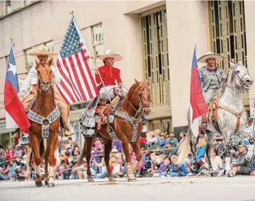  ?? Mark Mulligan/Staff photograph­er ?? The Houston Livestock Show and Rodeo kicks off with the Downtown Rodeo Parade.