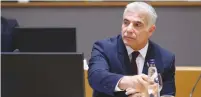  ?? (European Union) ?? FOREIGN MINISTER Yair Lapid seen at a meeting with European Union foreign ministers in Brussels yesterday.