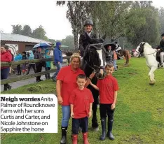  ??  ?? Neigh worriesani­ta Palmer of Roundknowe Farm with her sons Curtis and Carter, and Nicole Johnstone on Sapphire the horse