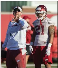  ?? (NWA Democrat-Gazette/Ben Goff) ?? Former University of Arkansas offensive coordinato­r Joe Craddock (left) has been hired as the tight ends coach at Alabama-Birmingham.