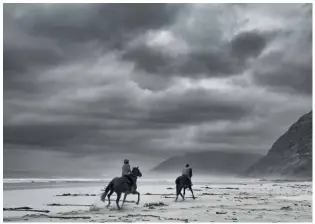  ??  ?? TOP LEFT
Early morning riders on Noordhoek Beach on a misty winter morning make for great subjects.