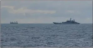  ?? (Special to The New York Times) ?? A Russian warship sails through U.S. waters in the Bering Sea off the coast of Alaska in this image from video provided by the fishing vessel Blue North.