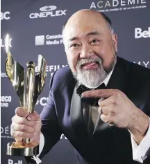  ?? PETER POWER/THE CANADIAN PRESS ?? Paul Sun-Hyung Lee of Kim’s Convenienc­e won as best comedy actor.