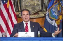  ?? DARREN MCGEE ?? In this photo provided by the Office of Governor Andrew M. Cuomo, Gov. Cuomo holds a press briefing on the coronaviru­s in the Red Room at the State Capitol in Albany, N.Y.