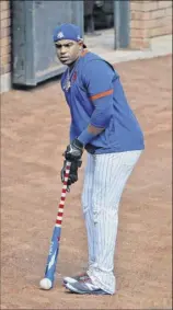  ?? Seth Wenig / Associated Press ?? new York mets left fielder Yoenis Cespedes works on his putting skills with his bat during a workout at Citi field early in camp. Cespedes says his legs are feeling much better than in march.