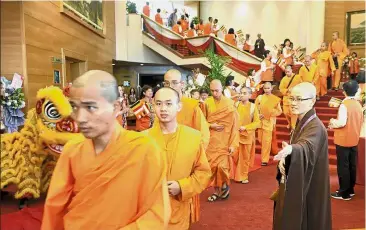  ??  ?? Ohm: Monks from 27 countries attending the 10th World Buddhist Sangha Council General Conference with an aim to promote harmony at Hotel Equatorial Penang.