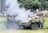  ??  ?? ‘American GIs’ arrive in their Jeep for a Second World War battle display