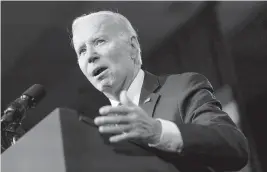  ?? PATRICK SEMANSKY AP ?? President Joe Biden speaks Friday at the Democratic National Committee Winter Meeting in Philadelph­ia. He cited job growth as proof his economic plan is working.