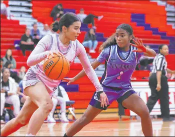  ?? Daniel Pearson Las Vegas Review-journal ?? Liberty’s Samantha Chesnut drives past Centennial’s Azaia Tatum during No. 2 Centennial’s 73-49 victory over No. 4 Liberty on Monday in Henderson.