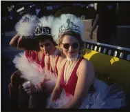  ??  ?? This Polaroid photograph was taken by Go-Gos manager Ginger Canzoneri during a break from a photo shoot for the cover of the band’s second album, “Vacation.” Sitting, from left, are an unidentifi­able Go Go, Belinda Carlisle, Kathy Valentine and Gina Schock.