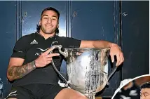  ?? GETTY ?? All Blacks centre Rieko Ioane with the Bledisloe Cup in Melbourne. First-five Richie Mo’unga, below, says their controvers­ial late win was ‘huge’.