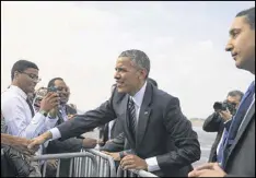  ?? MONICA HERNDON / TAMPA BAY TIMES ?? President Barack Obama arrives in Tampa, Fla., on Tuesday on his way to deliver a national security speech at MacDill Air Force Base.