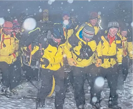  ??  ?? SUB-ZERO HEROES: The Cairngorm team who claim they are treated as being ‘expendable’ by helicopter controller­s