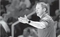  ?? WADE PAYNE/AP ?? After a rough loss Wednesday at Tennessee, Florida coach Mike White saw his Gators rally for a victory on Saturday.