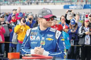  ?? AP PHOTO ?? Dale Earnhardt Jr. waits for a NASCAR Cup Series auto race at Kansas Speedway in Kansas City, Kan. on Sunday.
