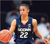  ?? Michael Conroy / Associated Press ?? UConn junior Evina Westbrook is the glue that keeps the Huskies together according to her teammates. Paige Bueckers calls Westbrook UConn’s MVP.