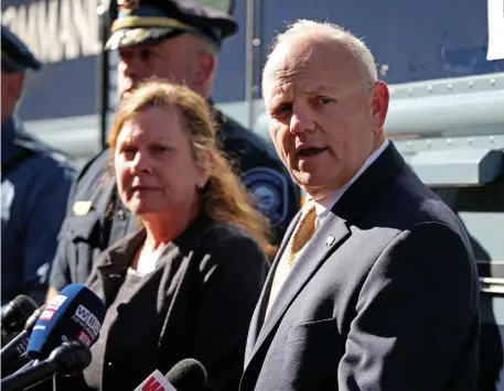  ?? STUART cAHILL PHOTOs / HeRALd sTAFF ?? ‘NOBODY DESERVED TO DIE’: Plymouth County District Attorney Tim Cruz speaks as law enforcemen­t officials announce they found the remains of Elijah Lewis, below right, on Saturday morning in Abington. Below left, the Medical Examiner’s vehicle leaves the scene.