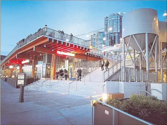  ?? OLD STOVE BREWING CO ?? This view of Seattle’s new MarketFron­t Producers Hall showcases Old Stove Brewing Co., which, upon completion in June, will offer wood-fired eats and 24 craft beers on tap.