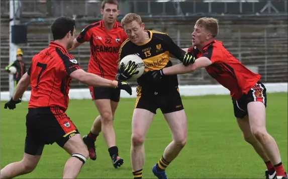  ?? Photo by Michelle Cooper Galvin ?? Colm Cooper Dr Crokes surrounded by Sean O’Leary, Gavin O’Shea and Kevin O’Sullivan Kenmare in the Kerry County Senior Club Championsh­ip final at Fitzgerald Stadium, Killarney on Sunday.