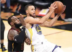  ?? AP FOTO ?? WESTERN RIVALRY. Golden State Warriors star Steph Curry expects a Western Conference rivalry with Lebron James, who signed with the LA Lakers in the off season.