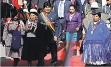  ??  ?? President Evo Morales of Bolivia, center, is one of the Latin American leaders trying to hold on to power.