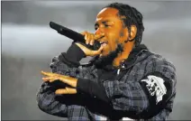  ?? Jack Plunkett The Associated Press ?? Rapper Kendrick Lamar again is up for album of the year.