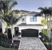  ?? PHOTO PROVIDED ?? Available as a Quick-Delivery-Home or a new build, the gorgeous two-story Capri at Tuscany features five bedrooms (including a huge master suite), four baths, a formal dining room, a loft, a two-car garage and 2,765 square feet of air-conditione­d...