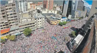  ?? YURI CORTEZ / AFP ?? Caracas. Vista panorámica de los partidario­s del líder opositor Juan Guaidó durante la manifestac­ión de ayer.