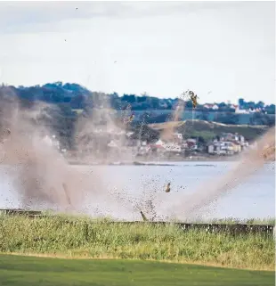  ?? Picture: Steve Brown. ?? An army bomb disposal unit from Edinburgh was called in to conduct the controlled explosion on Leven beach yesterday.