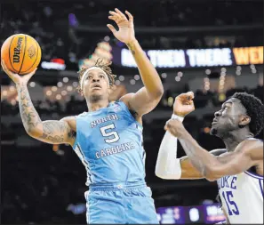  ?? David J. Phillip The Associated Press ?? North Carolina’s Armando Bacot has been a rebounding machine in the NCAA Tournament, with 22 against Saint Peter’s and 21 against Duke.