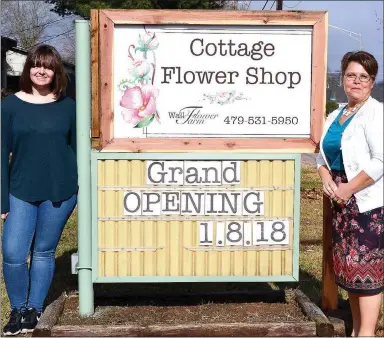  ?? TIMES photograph by Annette Beard ?? Mechel Wall (right) and India Carlson are the friendly faces at The Cottage Flower Shop at 1213 N. Curtis Ave.