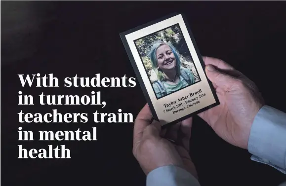  ?? JAE C. HONG/AP ?? Harry Bruell of Santa Barbara, Calif., holds a photo of his daughter, Taya, who took her own life in 2016 when she was 14.