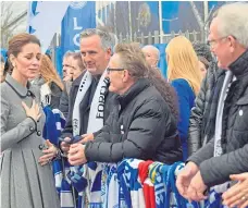  ?? Picture: PA. ?? The Duchess of Cambridge chats with people at King Power Stadium who were there to pay respects to the victims of the crash.