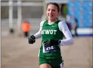  ?? PHOTO BY BRAD COCHI — SPECIAL TO THE DENVER POST ?? Niwot’s Addison Ritzenhein crosses the finish line to win the Class 4A girls title during the CHSAA state cross country championsh­ips at Norris Penrose Event Center, Colorado Springs on Saturday, October 28, 2023.